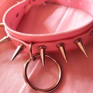 Pink spike choker, it's never been worn